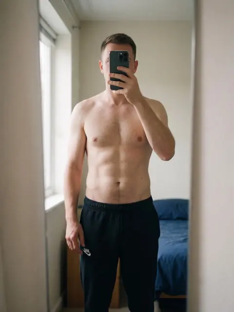 Same framing on July 17: a visibly leaner build, defined abs.